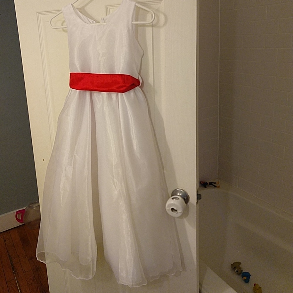 Girls White dress with red bow, brand new.